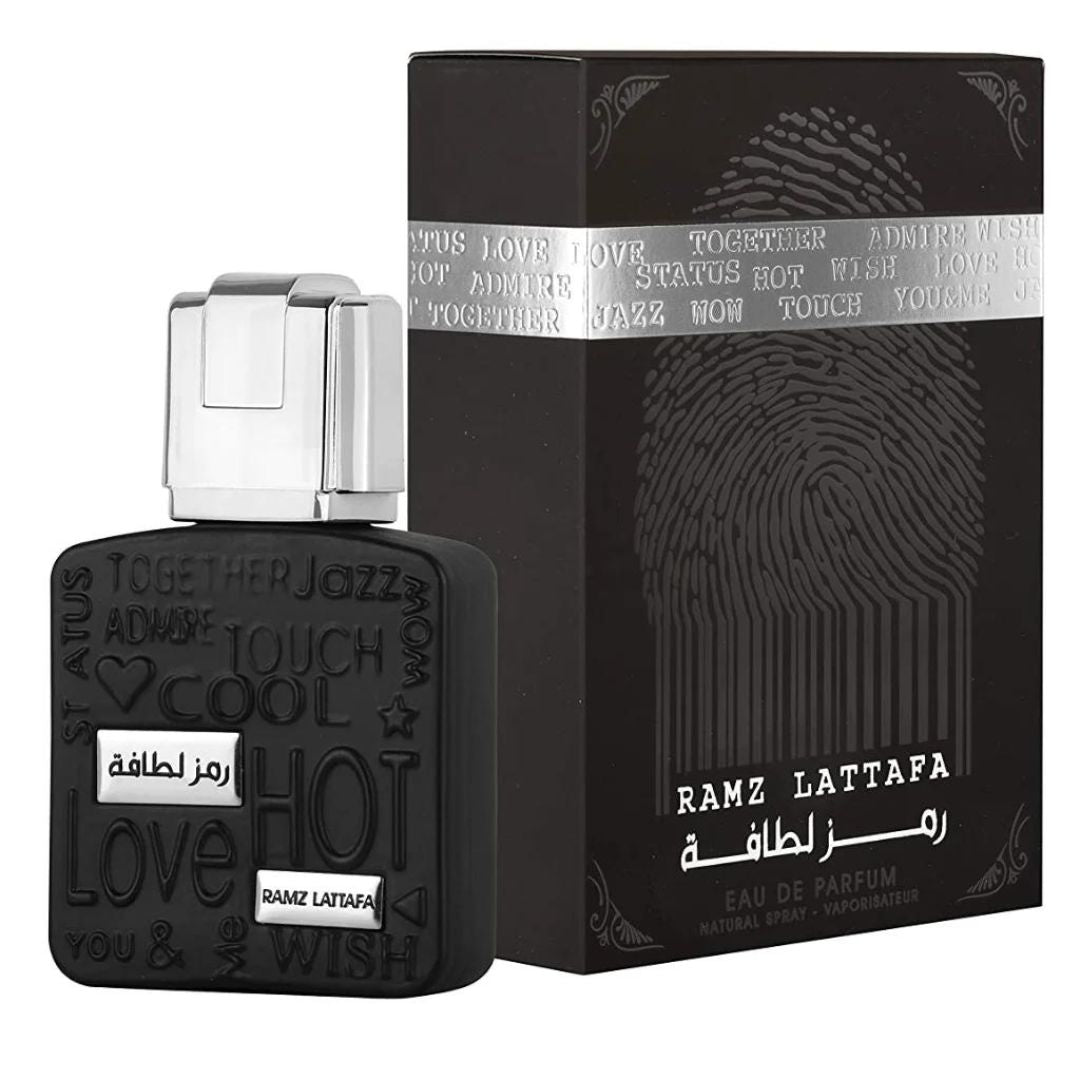 A 100ml bottle of Lattafa Ramz Silver, a unisex fragrance known for its fresh and woody scent.