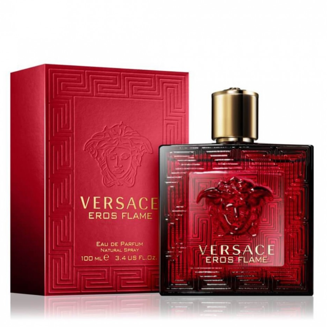 A bold red perfume bottle containing Versace Eros Flame, a fiery fragrance, with a volume of 100 milliliters.