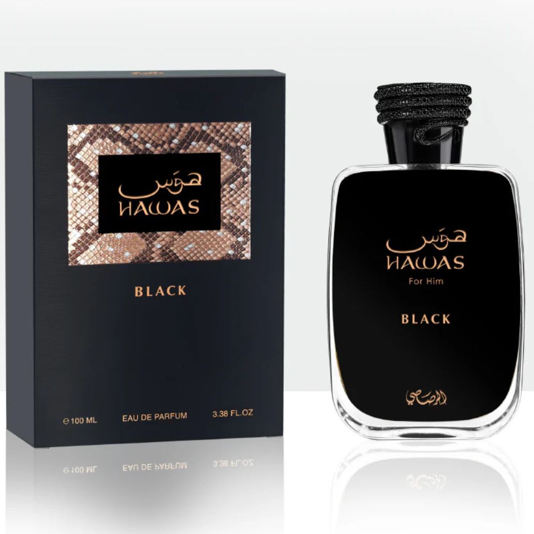 A black glass bottle with a gold cap, containing Rasasi Hawas Black Eau De Parfum. The fragrance is a luxurious blend of citrus, floral, and amber notes.